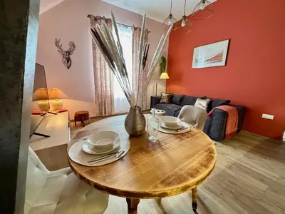 Coin salon dans l'établissement Le Kozy - Appartement 2 pièces rénové au coeur de Vendôme avec parking