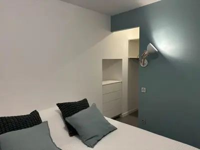 Un ou plusieurs lits dans un hébergement de l'établissement Charme Place Chateauneuf - Coeur de Tours