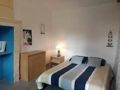 Un ou plusieurs lits dans un hébergement de l'établissement Maison champêtre