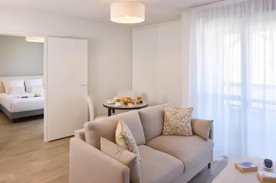 Un ou plusieurs lits dans un hébergement de l'établissement Quality Aparthotel Saumur