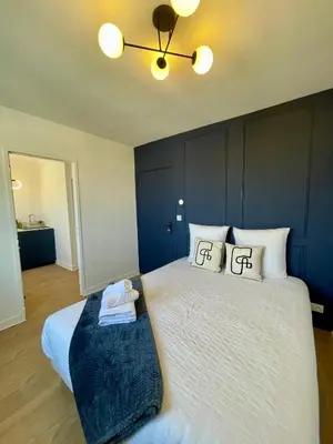 Un ou plusieurs lits dans un hébergement de l'établissement Appartement Gare 2 Personnes