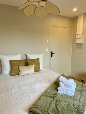 Un ou plusieurs lits dans un hébergement de l'établissement Appartement Gare 2 Personnes