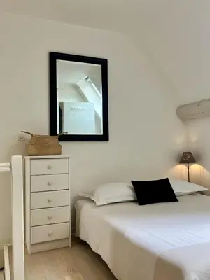 Un ou plusieurs lits dans un hébergement de l'établissement La Petite Maison d'à Côté