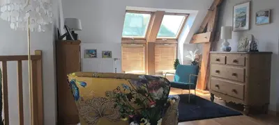 Coin salon dans l'établissement Maison moderne 150 m2 à 15mn du centre ville