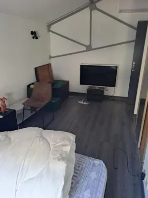 Télévision ou salle de divertissement dans l'établissement Chambres proche gare centre ville