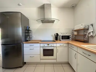 Cuisine ou kitchenette dans l'établissement La jocondie
