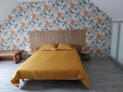 Un ou plusieurs lits dans un hébergement de l'établissement chambre lydie 1