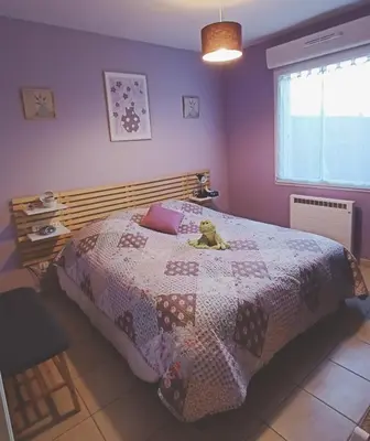 Un ou plusieurs lits dans un hébergement de l'établissement Chambre d'hôtes