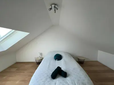 Un ou plusieurs lits dans un hébergement de l'établissement Charming Home in Parigné-l Évêque near Le Mans