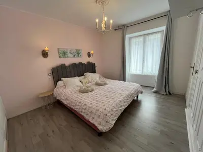Un ou plusieurs lits dans un hébergement de l'établissement Appartement 2 chambres - Oliver's home