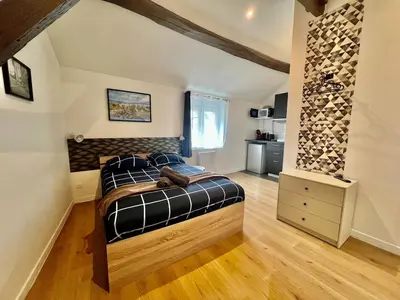 Un ou plusieurs lits dans un hébergement de l'établissement Studio Oslo-Charme & calme en Centre ville à pied avec parking gratuit