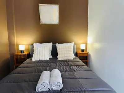 Un ou plusieurs lits dans un hébergement de l'établissement Appartement de la Gare
