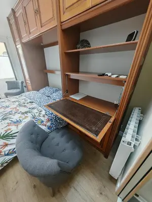 Un ou plusieurs lits dans un hébergement de l'établissement Suite avec parking 24h du mans