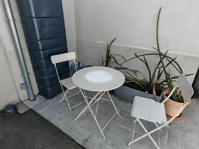 Coin salon dans l'établissement Suite avec parking 24h du mans