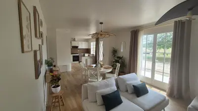 Coin salon dans l'établissement Gîte Au Cœur des Châteaux