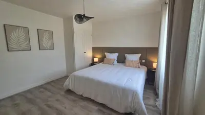 Un ou plusieurs lits dans un hébergement de l'établissement Gîte Au Cœur des Châteaux