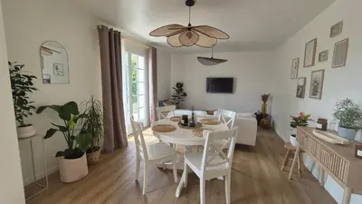 Télévision ou salle de divertissement dans l'établissement Gîte Au Cœur des Châteaux
