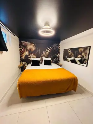 Un ou plusieurs lits dans un hébergement de l'établissement GÎTE Au 21 Loveroom