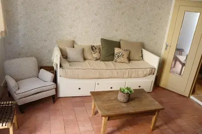Coin salon dans l'établissement Appartement au pied du château