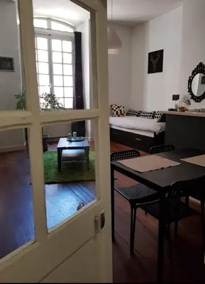 Un ou plusieurs lits dans un hébergement de l'établissement Vaste studio quartier historique