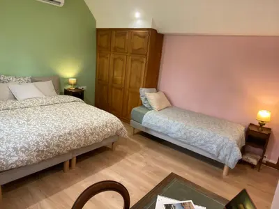 Un ou plusieurs lits dans un hébergement de l'établissement Domaine de la Closerie Champêtre - Chambres d'hôtes