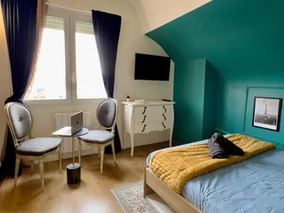 Un ou plusieurs lits dans un hébergement de l'établissement Studio Paris-Art déco lumineux & confort en plein centre