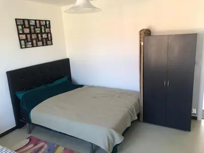 Un ou plusieurs lits dans un hébergement de l'établissement Location appartement entier T1 24h Le Mans
