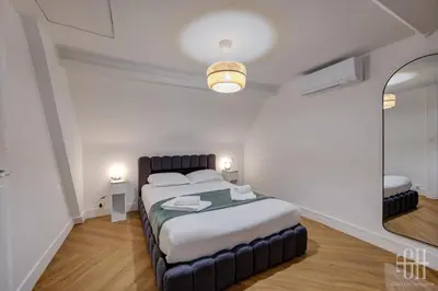 Un ou plusieurs lits dans un hébergement de l'établissement Villa Michelet - Jacuzzi - Sauna - Hyper Center