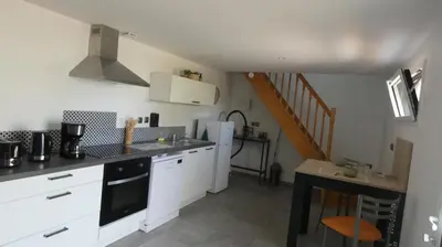 Cuisine ou kitchenette dans l'établissement Au long du cher
