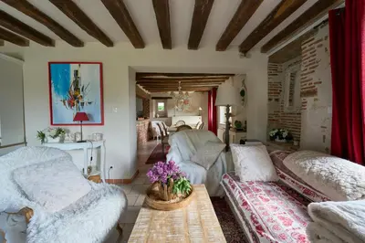 Coin salon dans l'établissement Chambres d'hôtes Le Theil