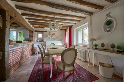 Coin salon dans l'établissement Chambres d'hôtes Le Theil