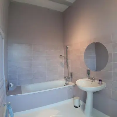 Salle de bains dans l'établissement L'Arcane Du Bellay