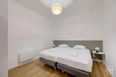 Un ou plusieurs lits dans un hébergement de l'établissement Gigi - Duplex - 4V - Chateau d amboise