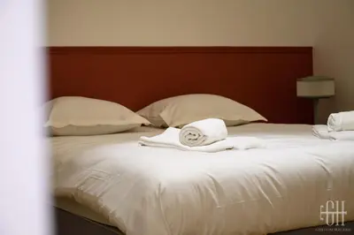 Un ou plusieurs lits dans un hébergement de l'établissement Gigi - Duplex - 4V - Chateau d amboise