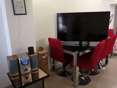 Télévision ou salle de divertissement dans l'établissement La Villa