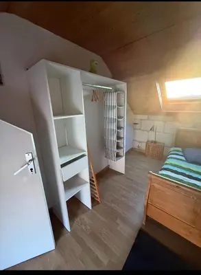 Un ou plusieurs lits dans un hébergement de l'établissement Maison Cosy Saumur