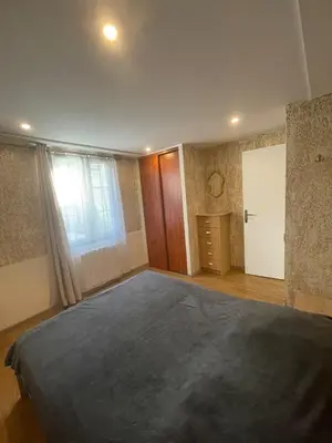 Un ou plusieurs lits dans un hébergement de l'établissement Charmante Apartment