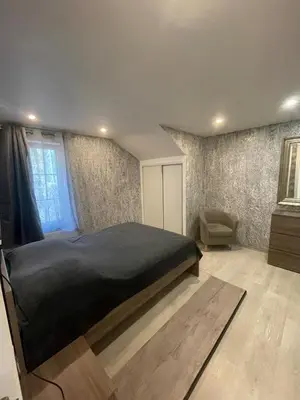 Un ou plusieurs lits dans un hébergement de l'établissement Charmante Apartment