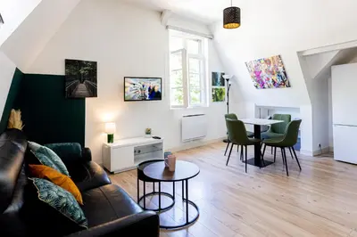Coin salon dans l'établissement Mirabeau Sous Les Toits 2 - Tours