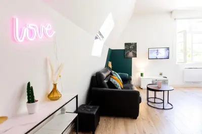 Télévision ou salle de divertissement dans l'établissement Mirabeau Sous Les Toits 2 - Tours