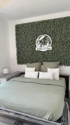 Un ou plusieurs lits dans un hébergement de l'établissement Gîte Relax'O'Zoo à 4min du Zoo