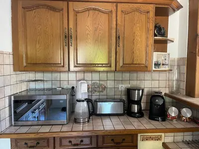 Cuisine ou kitchenette dans l'établissement House le Mans