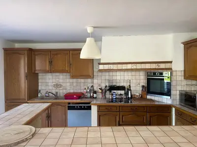 Cuisine ou kitchenette dans l'établissement House le Mans