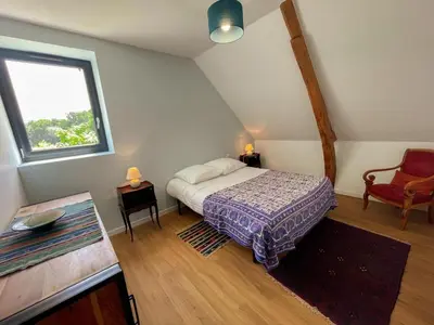 Un ou plusieurs lits dans un hébergement de l'établissement Gîte avec jardin privé, proche des châteaux, animaux admis - FR-1-381-627