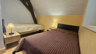 Un ou plusieurs lits dans un hébergement de l'établissement Gîte L'escapade vallée du Cher