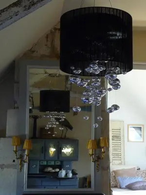 Télévision ou salle de divertissement dans l'établissement Escale de Loire Gîte