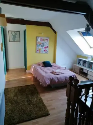 Un ou plusieurs lits dans un hébergement de l'établissement Chambres à louer à 10 minutes du Mans, dans la Sarthe