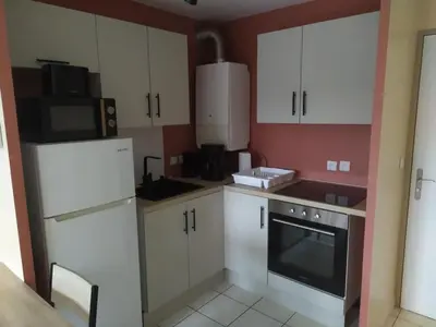 Cuisine ou kitchenette dans l'établissement T3 COSY 2 chambres proche TOURS