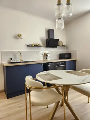 Cuisine ou kitchenette dans l'établissement La Volupté - Love room avec Jacuzzi - Sauna