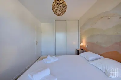 Un ou plusieurs lits dans un hébergement de l'établissement Le St Côme - 4V - 2 chambre - Proche Tours Centre